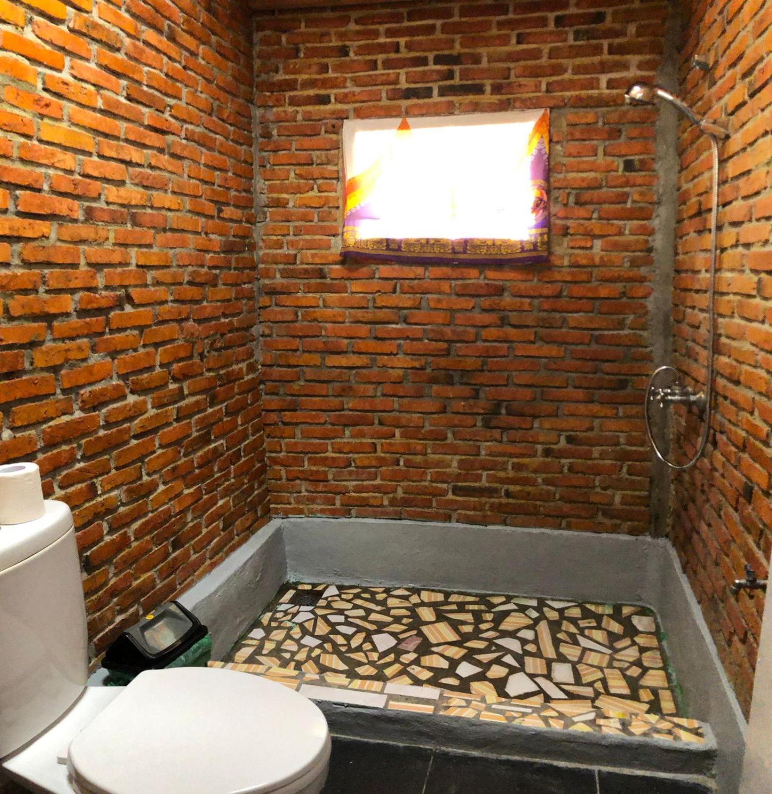 טוק טוק Hub Tata Guesthouse חדר תמונה